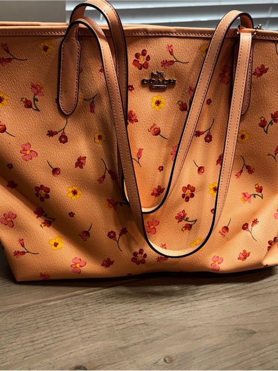 Coach Handbags - Coach Peach Floral Leather Tote with Gold Logo